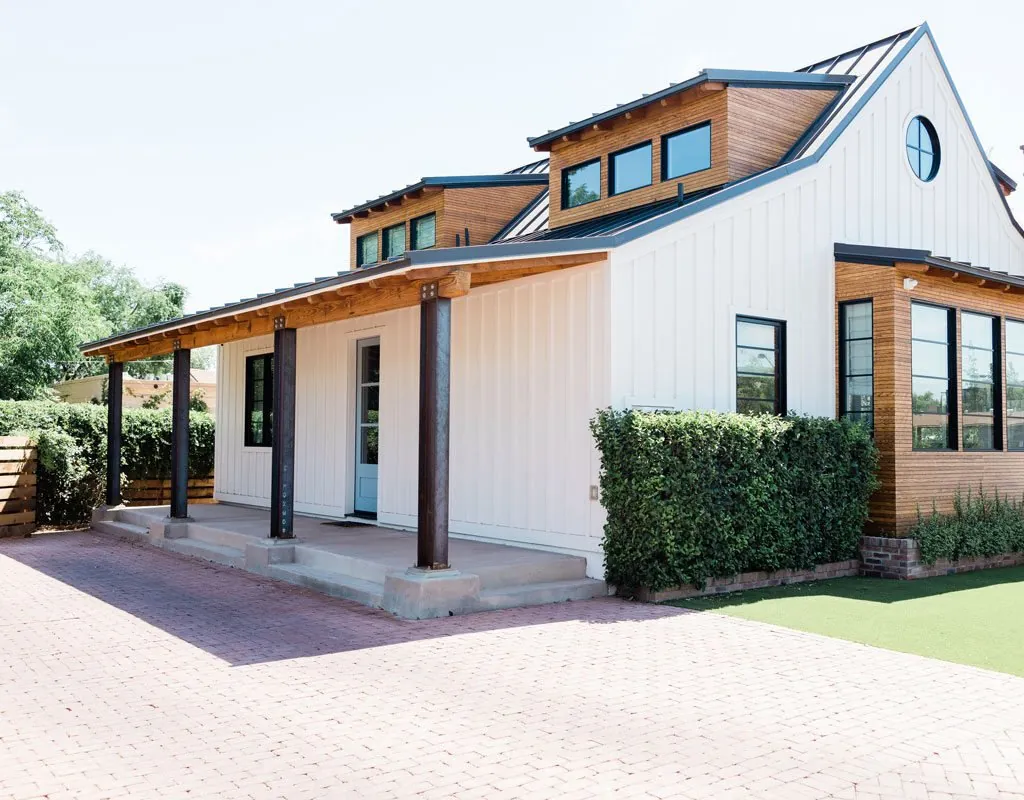 Florida custom home exterior with impact rated windows and doors